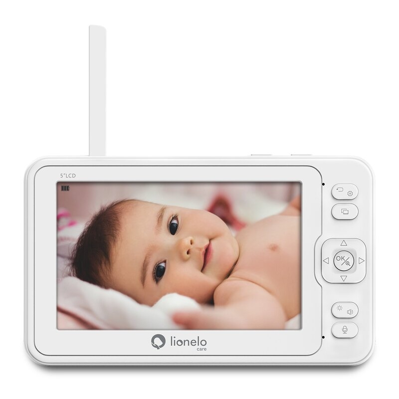 Lionelo - Videofon Babyline 8.3, Cu termometru, Cu melodii, Comunicare in 2 sensuri, Rotire 360 grade, Alb Lionelo - Videofon Babyline 8.3, Cu termometru, Cu melodii, Comunicare in 2 sensuri, Rotire 360 grade, Alb